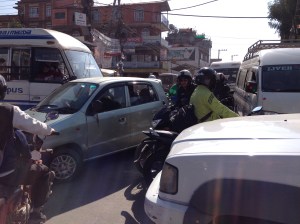 In traffic jammed Kathmandu, regular fuel shortages make hoarding fuel part of everyday life