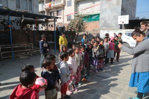 The children at ECDC, a home to children of Nepali prisoners, greet visitors.