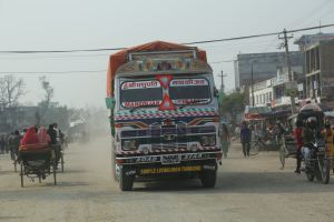 Truck windshields are festooned with taped decorations and plastic flowers making driving more challenging © Donatella Lorch