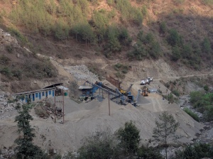 The cost of unfettered development is very visible in Nepal. Both licensed and illegal quarries strip the rivers of stone for building roads and houses but cause landslides, floods destroying homes and bridges. © Donatella Lorch