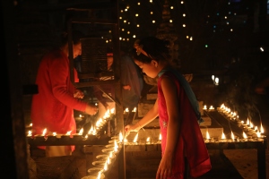 During Laxmi Puja, a festiva; that celebrates Laxmi, the Goddess of Wealth, Nepalese light up they city with butter lamps and worship her in the temples. ©Donatella Lorch