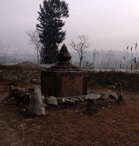 A solitary Shiva shrine sits amid wheat fields on the southern edge of the capital, Kathmandu. © Donatella Lorch