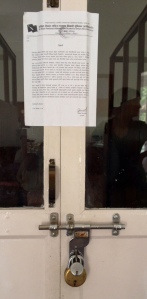 Padlocking, as a threat is often used by communist youth groups. Here a school accounting door was double locked and sealed. © Donatella Lorch