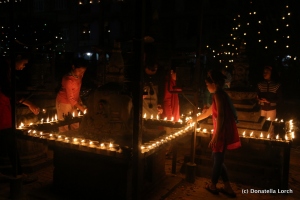 Nightime poetry during Tihar in Patan's old city. ©Donatella Lorch