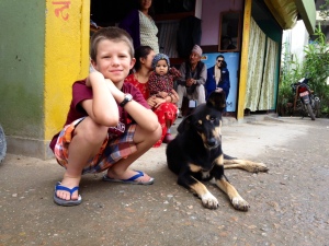 Lucas visit Raksi on her street side home where she lives with half a dozen other stray dogs. ©Donatella Lorch